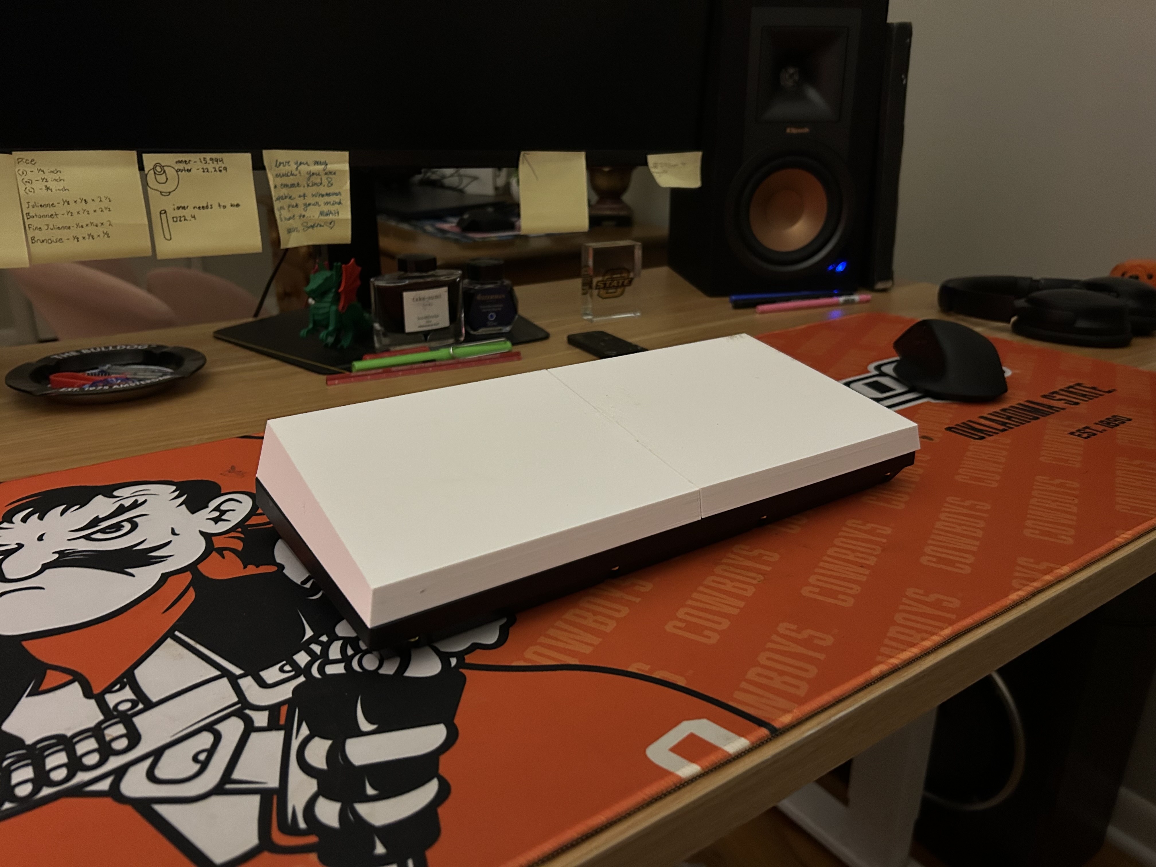 Elevated angle of the closed keyboard cover showing its low profile
